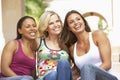 Three Girlfriends Sitting On Steps Of Building Royalty Free Stock Photo