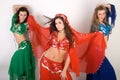 Three girls belly dancing