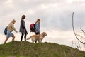 Three girls with a dog travel Royalty Free Stock Photo