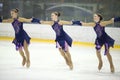 Three girls in dresses on ice Royalty Free Stock Photo
