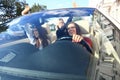 Three girls driving in a convertible car and having fun. Royalty Free Stock Photo