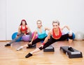 Three girls in fitnes club Royalty Free Stock Photo