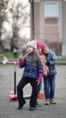 Three girls friends having fun together at playground in spring Royalty Free Stock Photo