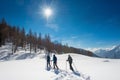 Three girls have fun on a snowshoe hike Royalty Free Stock Photo