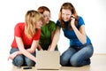 Three girls with a laptop Royalty Free Stock Photo