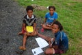 Three girls make schoolwork