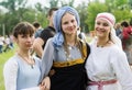 Three girls in medieval costumes