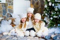 Three girls near a Christmas Royalty Free Stock Photo