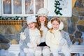 Three girls near a Christmas Royalty Free Stock Photo