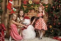 Three cute girls waiting for Christmas Royalty Free Stock Photo