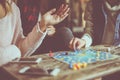 Three girls playing game man do not angry. Royalty Free Stock Photo