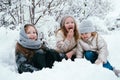 Three girls playing snow outdoor in the park, winter activity,seasonal holidays Royalty Free Stock Photo