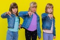 Three girls siblings friends showing thumbs down sign gesture, disapproval, dissatisfied, dislike Royalty Free Stock Photo