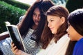 Three Girls Studying the Bible Together Royalty Free Stock Photo