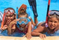 Three girls in the swimming pool Royalty Free Stock Photo