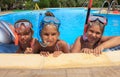 Three girls in the swimming pool Royalty Free Stock Photo