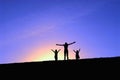 Three girls on top of the hill