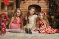 Three cute girls waiting for Christmas Royalty Free Stock Photo