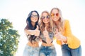 Three girls are walking in summer Park Royalty Free Stock Photo