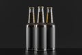 Three glass bottles over black background Royalty Free Stock Photo