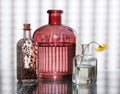 Three Glass Bottles and Wildflower Royalty Free Stock Photo