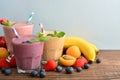 Three glass of fruit milkshakes Royalty Free Stock Photo