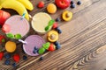 Three glass of fruit milkshakes Royalty Free Stock Photo