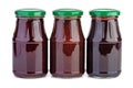 Three glass jar with strawberry,cherry and black currants jam Royalty Free Stock Photo