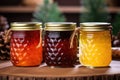 Three glass jars of jam from young pine cones or honey on a wooden stand. Traditional Siberian delicacy. Vitamin remedy for colds