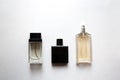 Three glass perfume bottles on white background Royalty Free Stock Photo