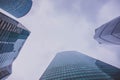 Three glass skyscrapers. bottom view of the sky. Royalty Free Stock Photo