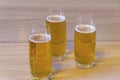 Three glasses of beer on the table. Royalty Free Stock Photo