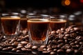 three glasses of coffee are surrounded by coffee beans