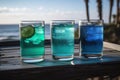 Three glasses of colored drinks, concept of fresh drinks Royalty Free Stock Photo