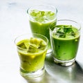 Three Glasses of Healthy Green Smoothie Shakes Royalty Free Stock Photo