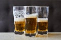 Three glasses of light beer Royalty Free Stock Photo