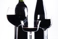 Three glasses with red wine and bottle Royalty Free Stock Photo