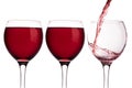 Three glasses with red wine isolated on white background Royalty Free Stock Photo