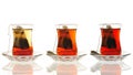 three glasses of Turkish tea in comparison from light to dark Royalty Free Stock Photo