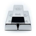 Stack of Three Shiny Silver Bullion Bars Labeled Fine Silver 9999 on a White Background ingot Royalty Free Stock Photo