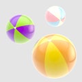 Three glossy colorful inflatable balls isolated