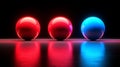Three glowing spheres in red and blue hues, reflecting light on a sleek surface Royalty Free Stock Photo