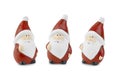 Three gnomes with a white beard in red clothes and caps on a white background.