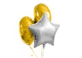 Three gold and silver helium balloons on white