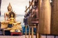 Three golden buddha statue sitting on the hill. Royalty Free Stock Photo