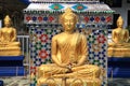 Three golden Buddha statues at Thai temple Royalty Free Stock Photo