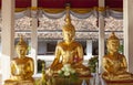 Three golden Buddhas. Royalty Free Stock Photo