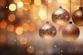 Three golden Christmas ornaments hanging Royalty Free Stock Photo