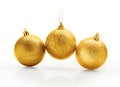 Three golden and sparkling christmas balls Royalty Free Stock Photo