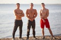 shirtless young bodybuilders on a river background. Healthy lifestyle concept.